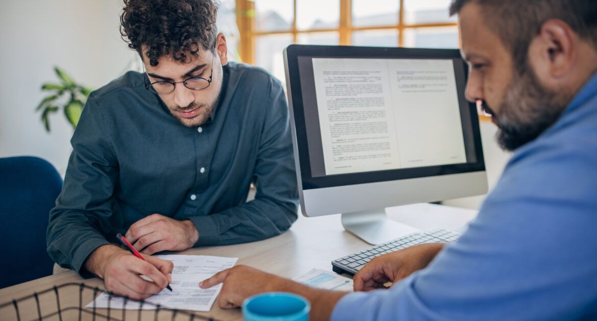 Man on job interview showing 10 MORE things not to do on your CV