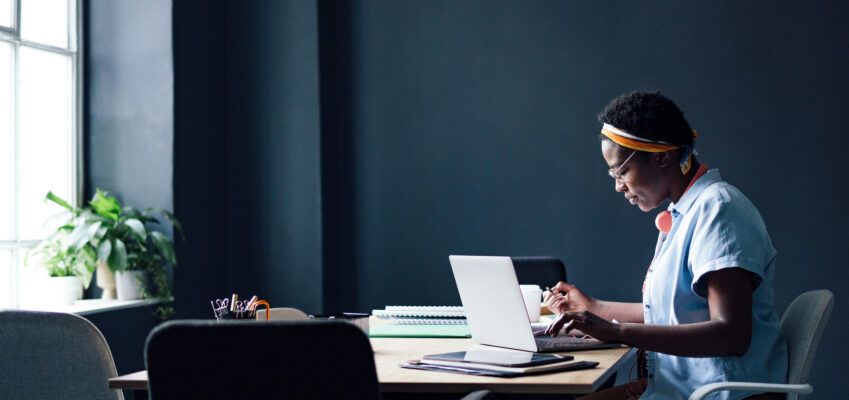University Student Working On A School Project In The Library