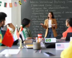 Teacher explaining material to students at lesson
