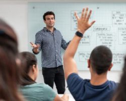 Male teacher teaching in classroom