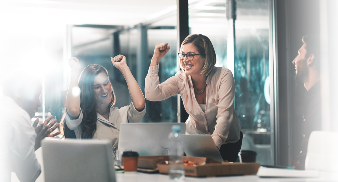 Team celebrating, showing employee happiness