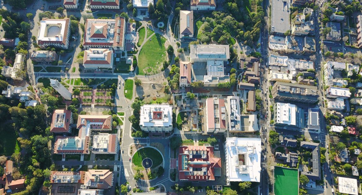 Drone Aerial over Suburban/Urban City, further education Campus