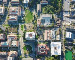 Drone Aerial over Suburban/Urban City, further education Campus