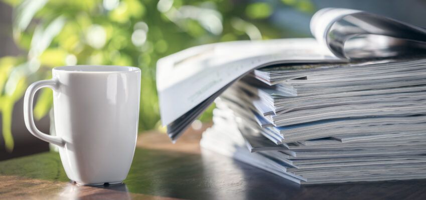 Journal pile on table