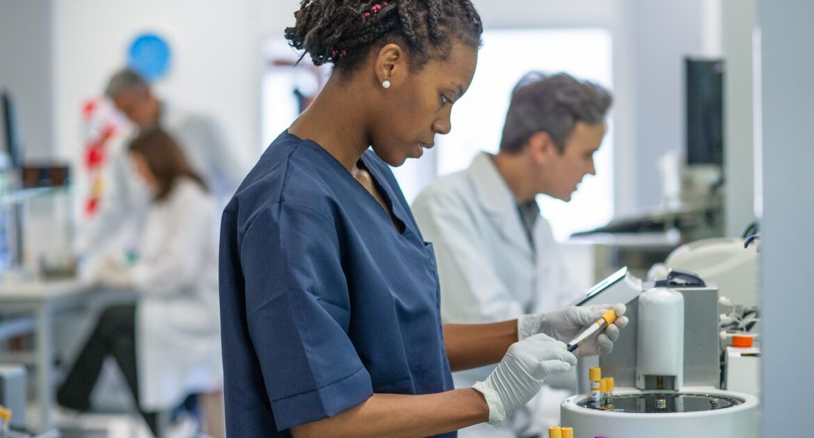 Immunology lecturer working in lab