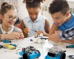 Kids working on a robot design Inspiring future STEM leaders