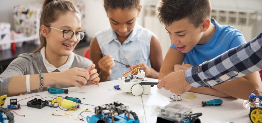 Kids working on a robot design Inspiring future STEM leaders