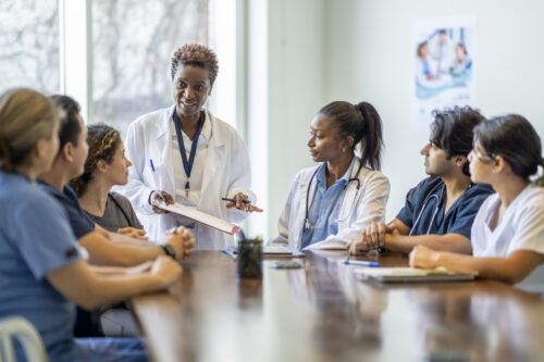 Female Doctor Teaching Nursing Students