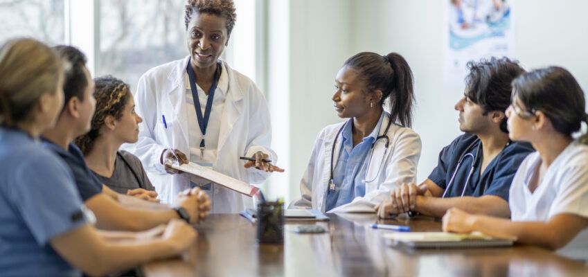 Female Doctor Teaching Nursing Students