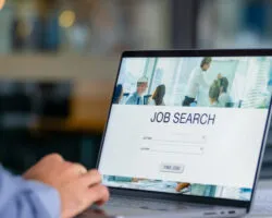 Close up of a man looking at a job search recruitment web page