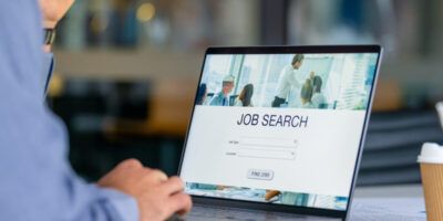 Close up of a man looking at a job search recruitment web page