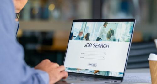 Close up of a man looking at a job search recruitment web page