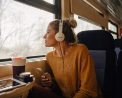 Young woman riding a train