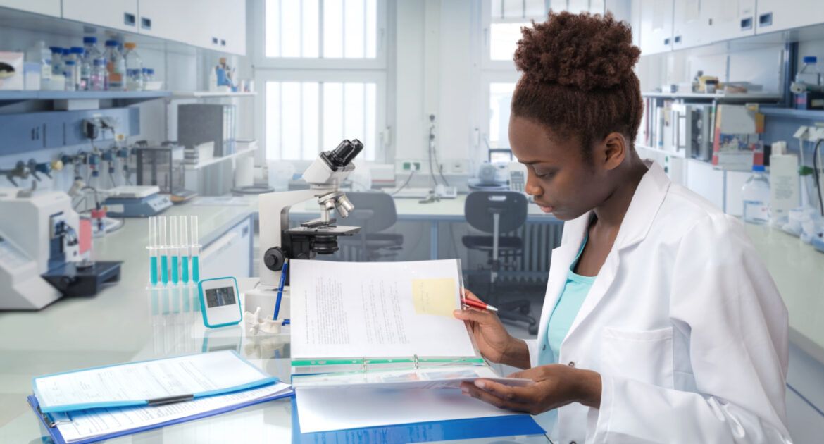 African scientist, medical worker or tech in modern laboratory