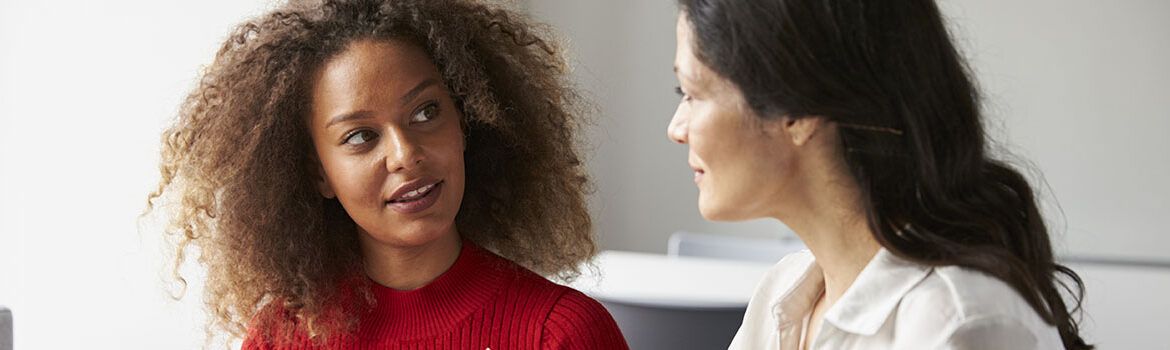 Woman asking key question when starting a new job