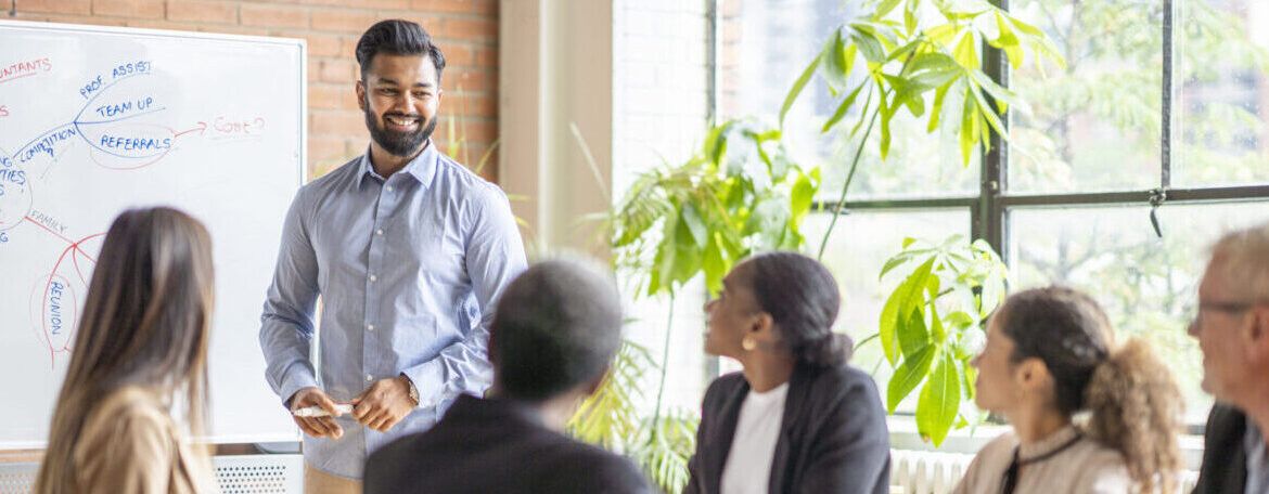 Gentleman Leading a Business Meeting