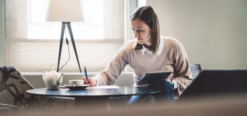 A girl writing a literature review