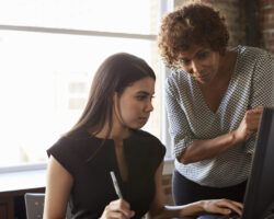 two females working together