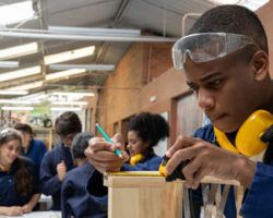 students in fe working on wood work